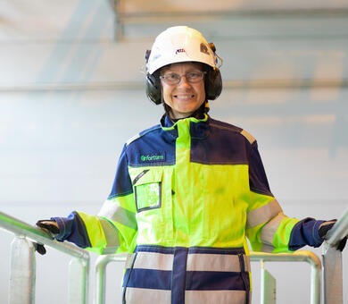 Woman wearing safety clothes and equipment